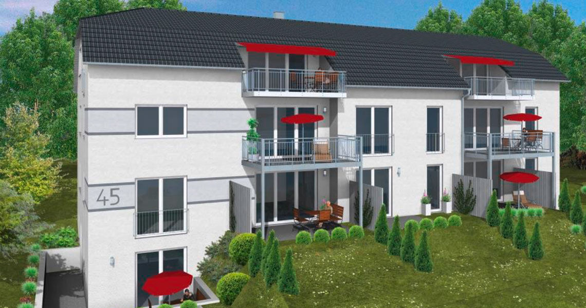 Aussenansicht eines Mehrfamilienhauses mit großzügigen Balkonen und Grünanlage